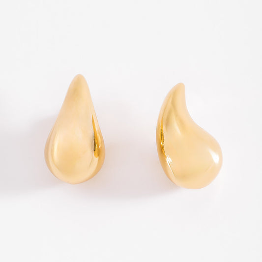 Aretes curvos baño de Oro diseño gota elegante