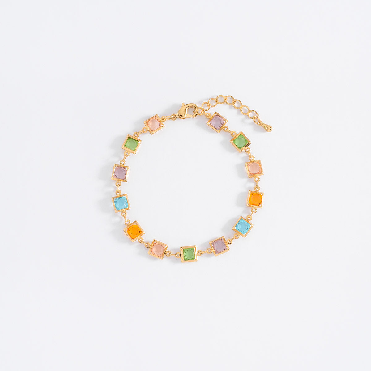 Pulsera de baño de oro con piedras tonos rosa y azul