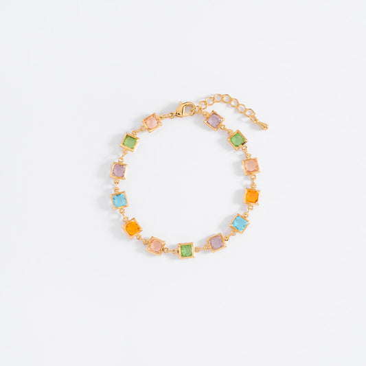 Pulsera de baño de oro con piedras tonos rosa y azul