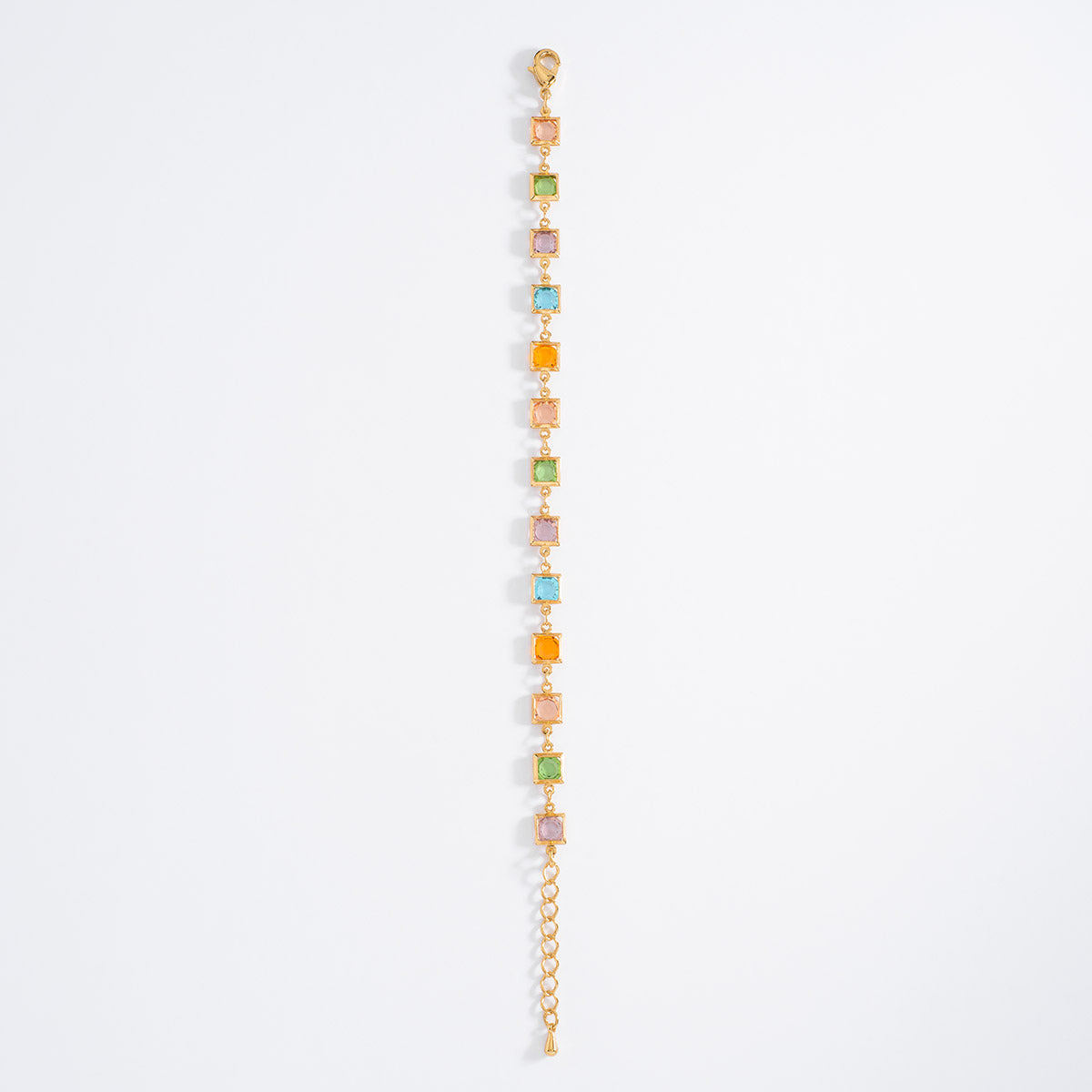 Pulsera de baño de oro con piedras tonos rosa y azul