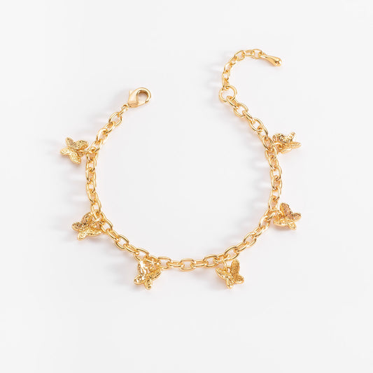Pulsera en baño de oro con dijes de mariposas