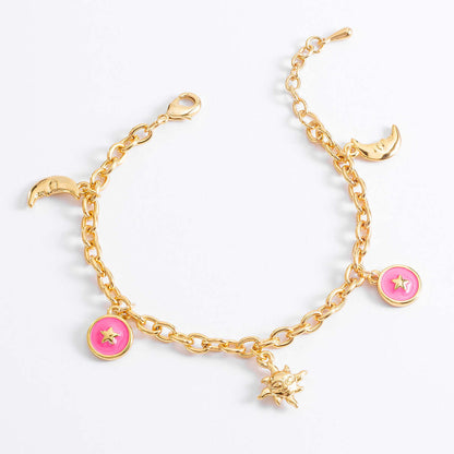 Pulsera de oro con dijes de luna sol y estrellas
