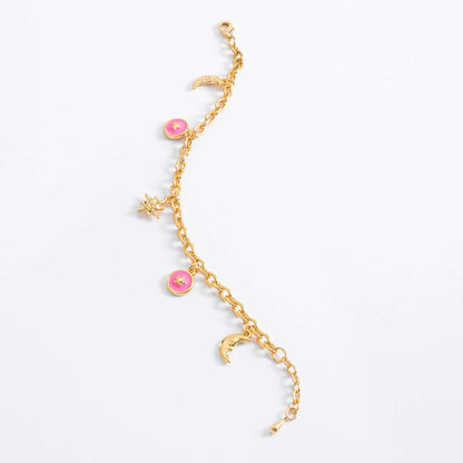 Pulsera de oro con dijes de luna sol y estrellas