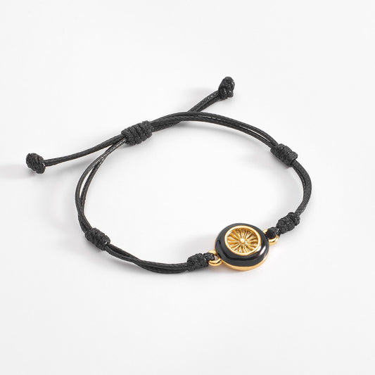 Pulsera ajustable negro y dorado con baño de oro 18k