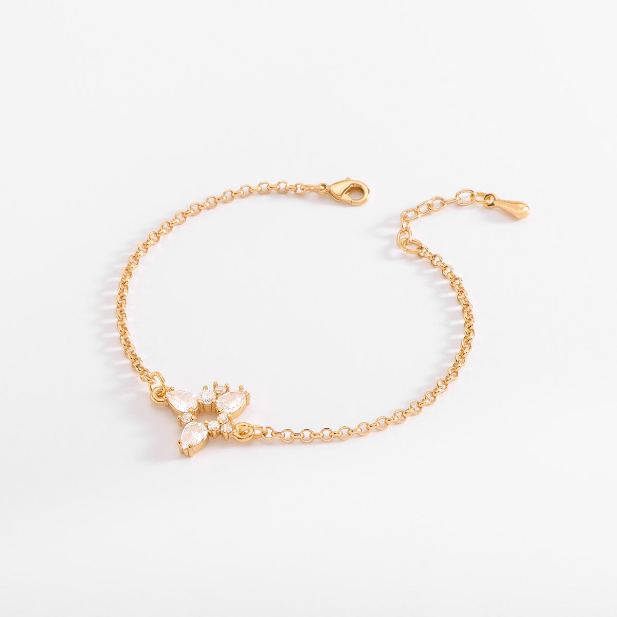 Pulsera en baño de oro con dije triangular y Diamonice
