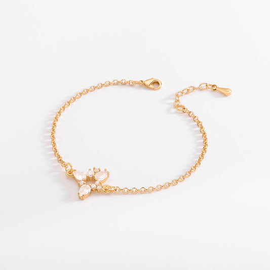 Pulsera en baño de oro con dije triangular y Diamonice