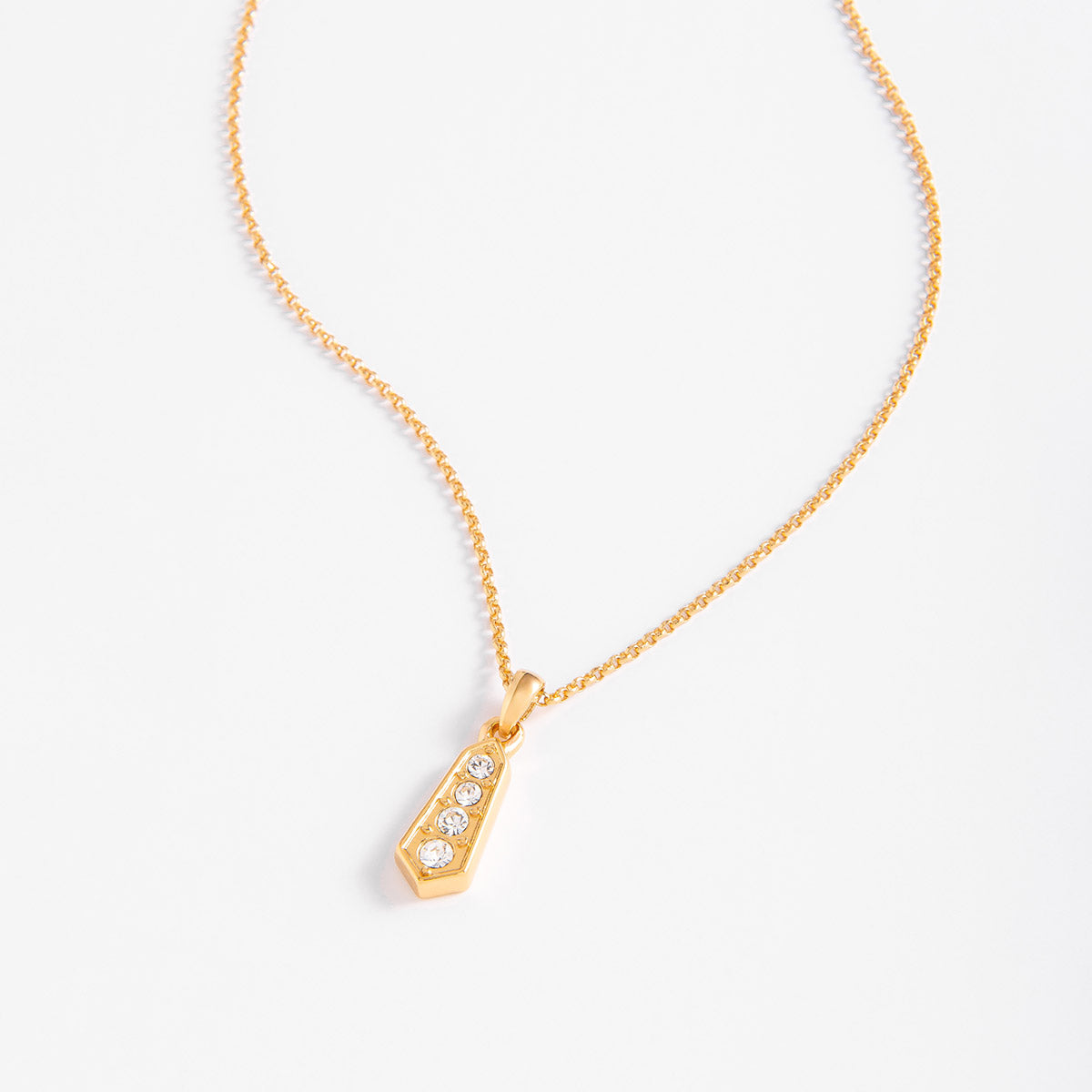Collar de oro 18k con dije geométrico y piedras