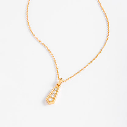 Collar de oro 18k con dije geométrico y piedras