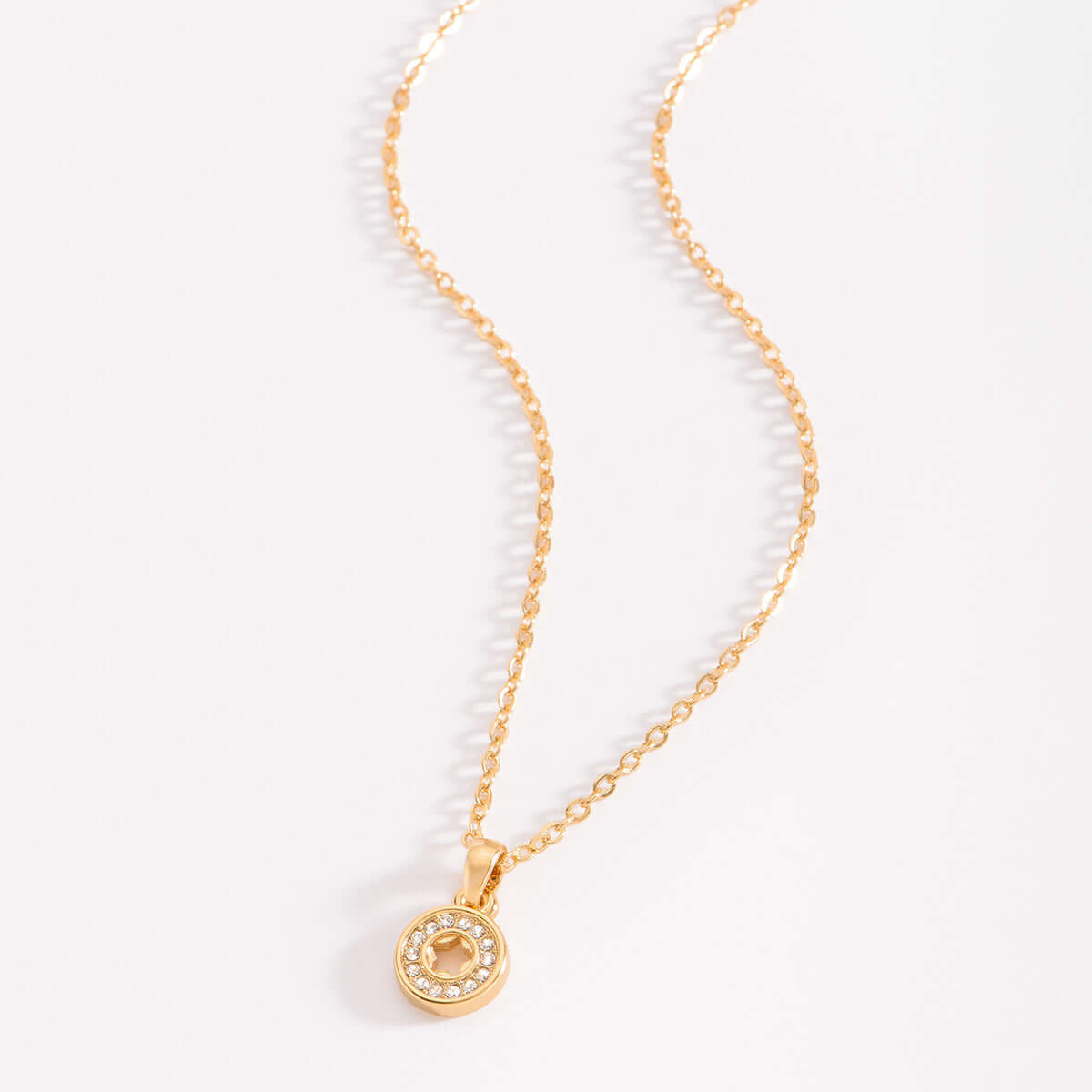 Collar con dije baño de oro y piedras cristalinas